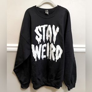Stay Weird glow in the dark sweater